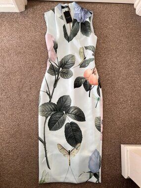 The magnificent gowns in sterling silver are from the TED BAKER brand.